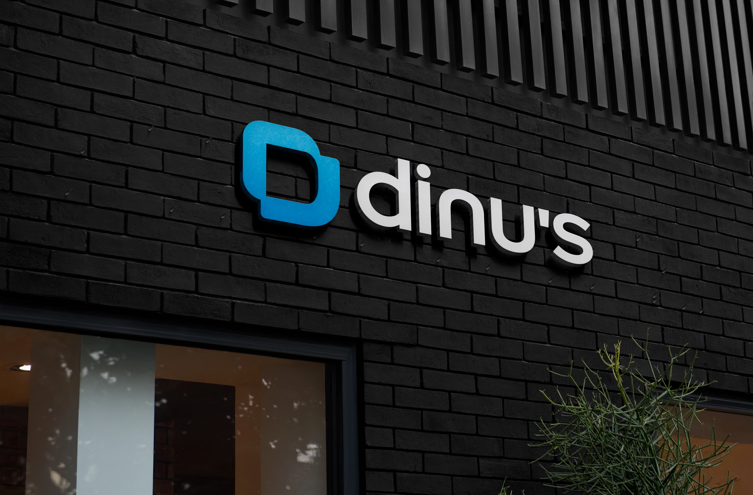 Facade with the DINU’S logo in 3D letters