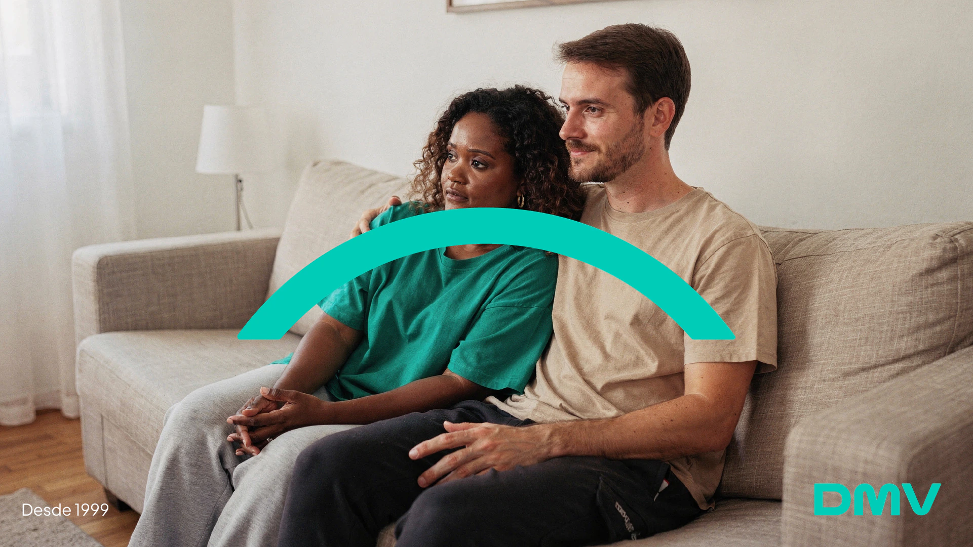 Couple on a sofa under the DMV arch