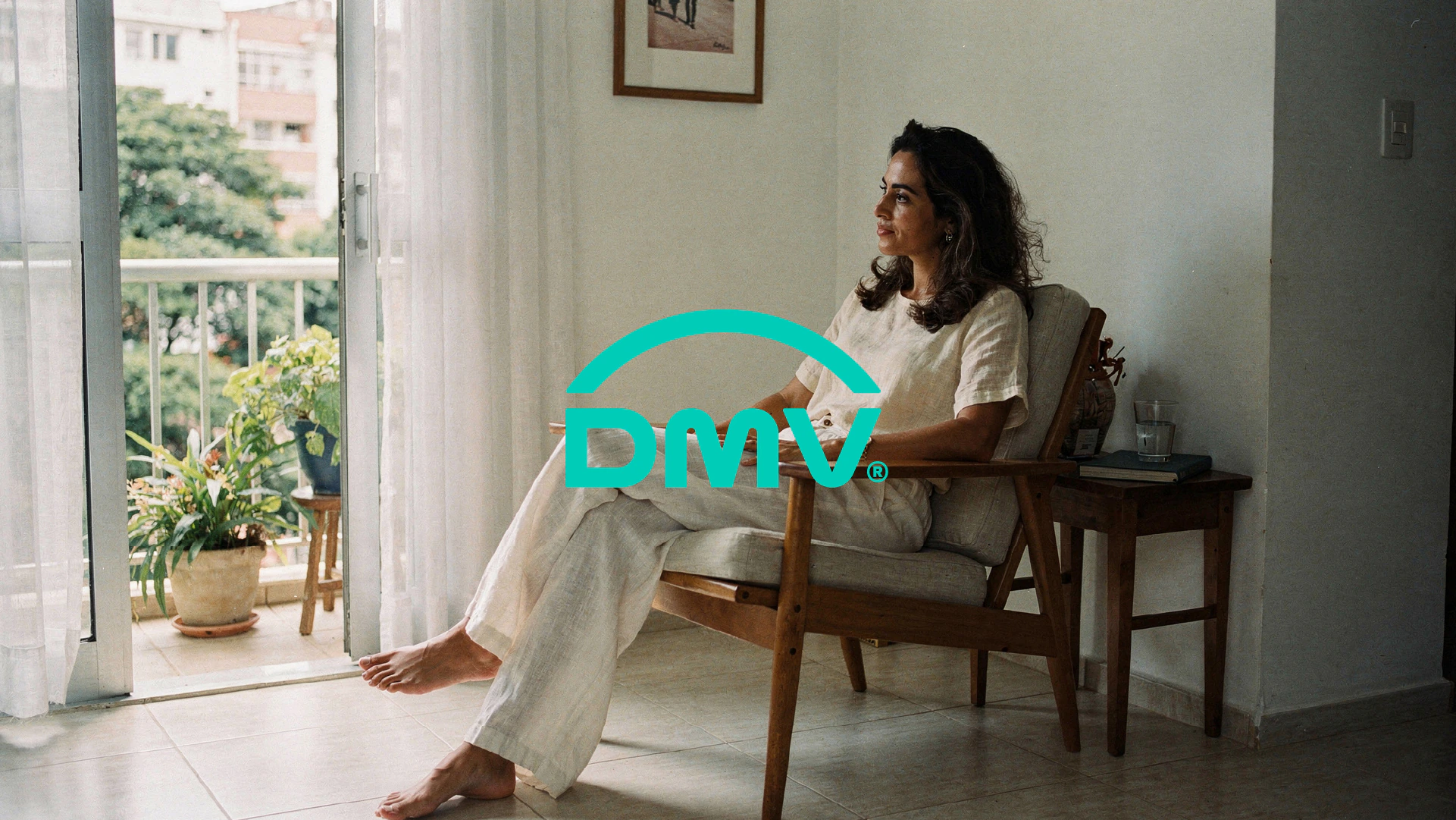Woman resting at home with the DMV symbol