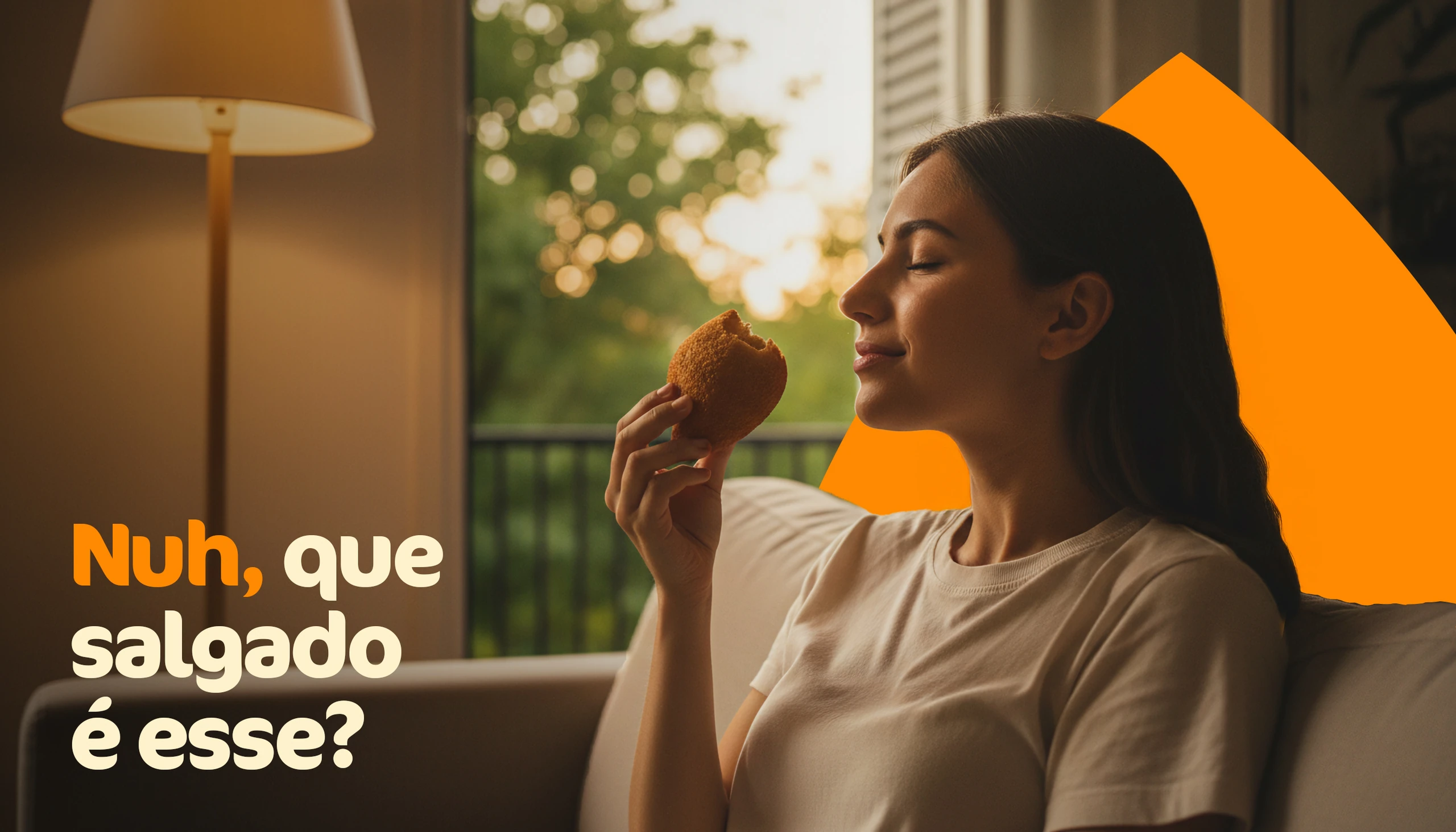 Ad reading “Nuh, que salgado é esse?” (Whoa, what snack is this?) with a woman eating a snack